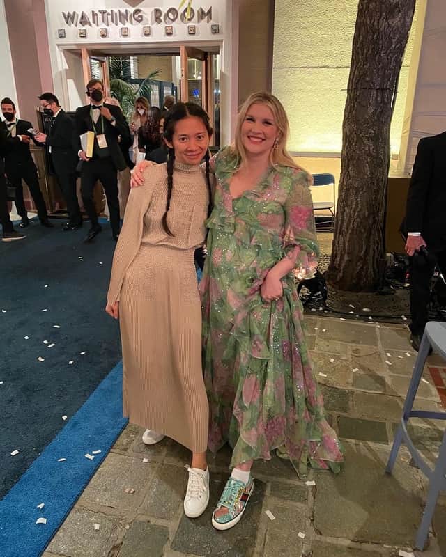Emerald Fennell and Chloe Zhao at the 2021 Oscars - showing off their fashion trainers