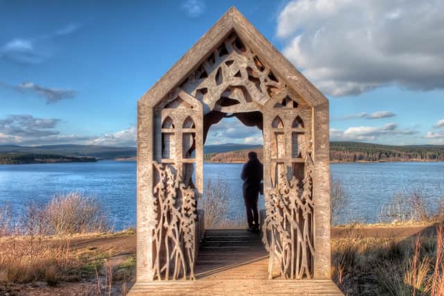 Timber Cabin Hut near a Lake at Kielder Water and Forest Park.jpg
