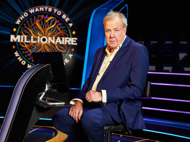 Jeremy Clarkson, sat in the host’s chair on set of Who Wants to be a Millionaire? (Credit: Stellify Media)
