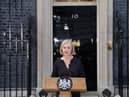 Prime Minister Liz Truss reads a statement outside 10 Downing Street, London, following the announcement of the death of Queen Elizabeth II. Picture date: Thursday September 8, 2022.