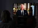 A child watching a broadcast of King Charles III first address to the nation as the new King following the death of Queen Elizabeth II on Thursday. Picture date: Friday September 9, 2022.