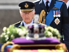 King Charles III walks behind the coffin of Queen Elizabeth II. Photo: Getty