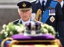 King Charles III walks behind the coffin of Queen Elizabeth II. Photo: Getty