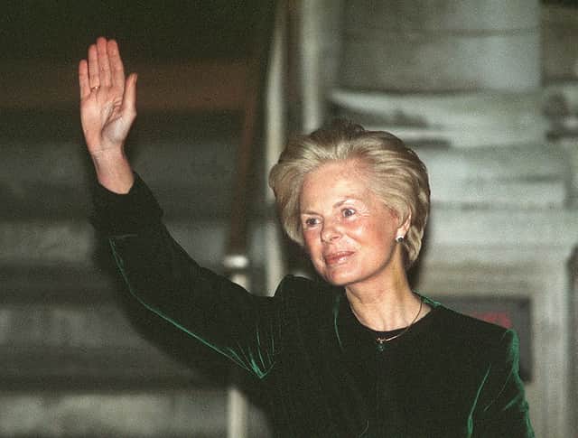 The Duchess of Kent waves to the media in 1994.