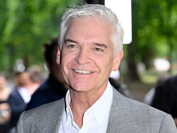 Phillip Schofield’s We Buy Any Car images are replaced online after allegation of jumping the queue, at Westminster Hall. (Photo by Gareth Cattermole/Getty Images)