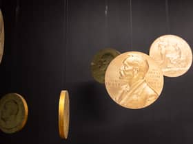 Replicas of the official Nobel Peace Prize gold medal.