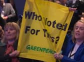 Protestors heckle Prime Minister Liz Truss during her keynote speech at the Conservative Party Conference 2022 in Birmingham.