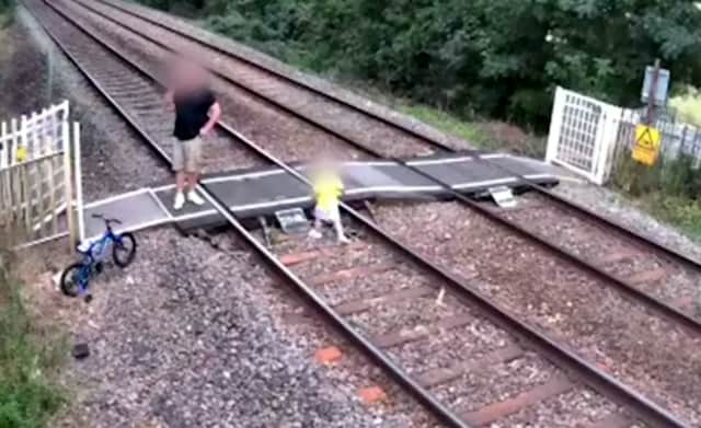 CCTV footage released by Network Rail capturing some of the reckless behaviour at a popular level crossing.  