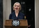 Britain’s Prime Minister Liz Truss delivers a speech outside of 10 Downing Street in central London on October 20, 2022 to announce her resignation.  (Photo by Daniel LEAL / AFP) (Photo by DANIEL LEAL/AFP via Getty Images)