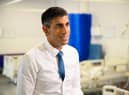 Prime Minister Rishi Sunak speaks with members of the media as he visits Croydon University hospital on October 28.