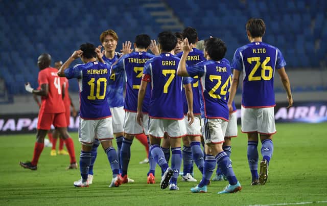 Soma Yuki of Japan celebrates scoring an opening goal with his teammates during the international friendly against Canada (Photo by Martin Dokoupil/Getty Images)