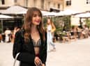 Lily Collins as Emily in Emily in Paris Season 3 (Credit: STÃPHANIE BRANCHU/NETFLIX)