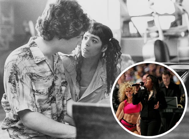 <p>Bruno Martelli (Lee Curreri) tries to convince Coco Hernandez (Irene Cara) they should form a rock band, in a scene from 'Fame'. Inset: Irene Cara performs before the AFL Grand Final match in 2006</p>
