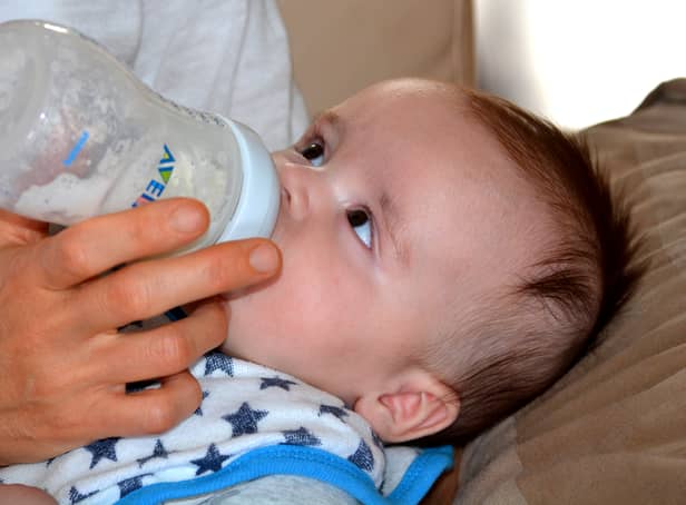 <p>A baby drinks formula from a bottle. Pic: Pixabay.</p>