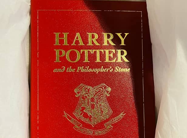 <p>The leather-bound special 15th  anniversary edition of Harry Potter and the Philosophers Stone -  published exclusively for the competition in 2012.</p>