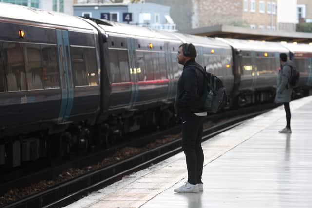 Travellers at Victoria Station on December 5, 2022 in London, England. Workers represented by the Rail, Maritime and Transport union rejected an initial offer on Monday from a group representing rail companies. If the strikes go ahead, workers are set to walk out on eight separate days over December and January, affecting 14 train firms and Network Rail. The first days will be December 13-14. (Photo by Hollie Adams/Getty Images)