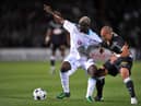 (FILES) In this file photo taken on September 13, 2008 Girondin’s forward Yoan Gouffran (R) fights for the ball with with Marseille’s Cameroonian midfielder Modeste M’ Bami during the French L1 football match between Bordeaux and Olympique de Marseille, at the Chaban Delmas stadium in Bordeaux, southwestern France. - Cameroonian Modeste M’Bami, former midfielder for Paris Saint-Germain and Olympique de Marseille died aged 40 in Le Havre, announces sports agent Frank Belhassen, on January 7, 2023. (Photo by PIERRE ANDRIEU / AFP) (Photo by PIERRE ANDRIEU/AFP via Getty Images)