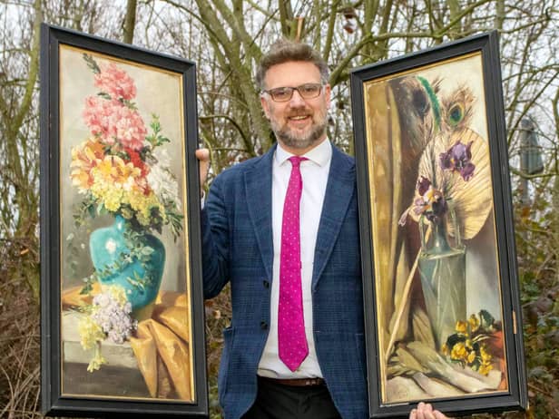 Charles Hanson, owner of Hansons Auctioners, with Queen Victoria’s paintings.  
