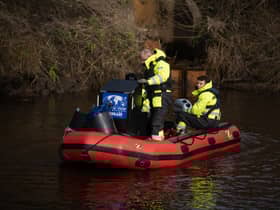 Specialists search the River Wyre this morning (February 6).