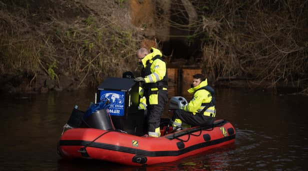 Specialists search the River Wyre this morning (February 6).