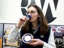 A rare cup and saucer thought to have been used by passengers on the Titanic has sold for thousands at auction
