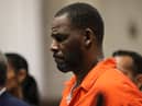 R&B singer R Kelly has an extra year added to his 30 year prison sentence for charges related to child enticement & indecent photos of children.