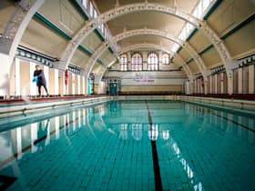 Stephanie Jones Duty Manager cleaning The Moseley Road Baths after renovation