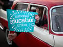 A driver supporting the NEU strike action (Photo: Getty)