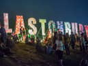 Festival-goers enjoy the atmosphere prior to the 2013 Glastonbury Festival at Worthy Farm. (Photo by Ian Gavan/Getty Images)