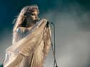 Riley Keough as Daisy Jones in Daisy Jones & The Six, performing in a style reminiscent of Stevie Nicks (Credit: Lacey Terrell/Prime Video)