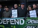 RMT general secretary Mick Lynch (centre) on an RMT picket line during January’s strike (Photo by DANIEL LEAL/AFP via Getty Images)