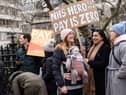Demonstrators hold placards as they take part in a protest by junior doctors. Picture: NIKLAS HALLE’N/AFP via Getty Images