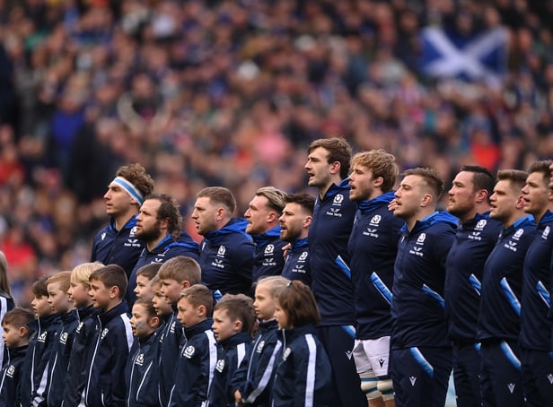 <p>The Scotland team sing the national anthem during a Six Nations Rugby match at Murrayfield Stadium</p>