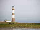 North Ronaldsay Lighthouse in the Orkney Islands is one of the 208 lighthouses operated by NLB.