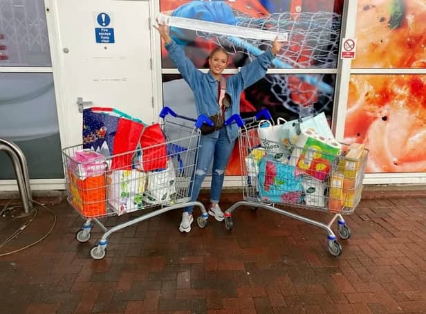 Only Fans star Amber O’Donnel at Tesco after shopping for her food parcel donations - Credit: SWNS