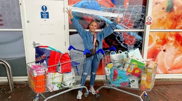 Only Fans star Amber O’Donnel at Tesco after shopping for her food parcel donations - Credit: SWNS