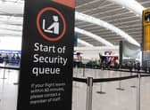 A sign indicating the start of the security queue during a strike by security workers at London Heathrow Airport in London, UK, on Friday, March 31, 2023. IAG SAsÂ British AirwaysÂ is set to scrap 320 flights during the Easter week as security workers strike for 10-days over pay. Photographer: Chris Ratcliffe/Bloomberg via Getty Images