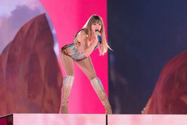 TOPSHOT - US singer-songwriter Taylor Swift performs onstage on the first night of her "Eras Tour" at AT&T Stadium in Arlington, Texas, on March 31, 2023. (Photo by SUZANNE CORDEIRO / AFP) (Photo by SUZANNE CORDEIRO/AFP via Getty Images)