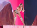 TOPSHOT - US singer-songwriter Taylor Swift performs onstage on the first night of her "Eras Tour" at AT&T Stadium in Arlington, Texas, on March 31, 2023. (Photo by SUZANNE CORDEIRO / AFP) (Photo by SUZANNE CORDEIRO/AFP via Getty Images)