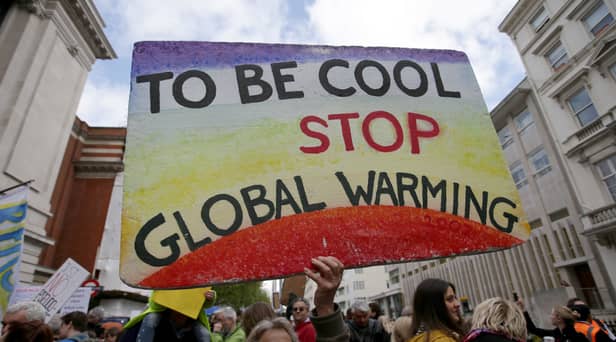 Scientists and science enthusiasts gather prior to the start of the 'March for Science' which celebrates the scientific method outside the Science Museum in central London on April 22, 2017, Earth Day