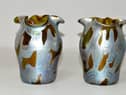 A pair of vases bought by a Staffordshire mum for just 8 at a Spanish car boot sale are set to sell at auction in Lichfield for hundreds of pounds. 