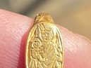 The 15th Century gold ring Matthew Hepworth found buried in a farmer’s field. 