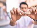 Smokers spend enough on cigarettes in their lifetime to afford four brand new family cars (SWNS)