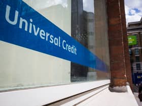  A Universal Credit sign in the window of the Job Centre in Westminster.