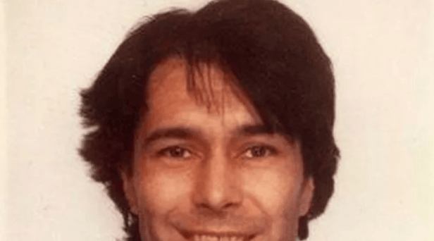 Human remains found in Welsh woodland have been confirmed to be that of Russell Scozzi, a computer expert who was last seen 20 years ago. 