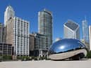 The Cloud Gate sculpture, popularly known as the bean, with Chicago's skyline