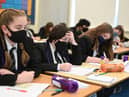 Face coverings should be worn in all communal areas of schools and colleges in England from Monday (29 November) (Photo: Getty Images)