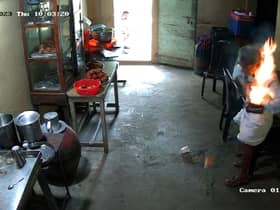 CCTV footage shows the moment a man’s phone bursts into flames in his pocket 