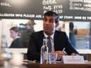 Rishi Sunak says young people should return to offices for the benefit of their careers (Photo by Stefan Rousseau-WPA Pool/Getty Images)
