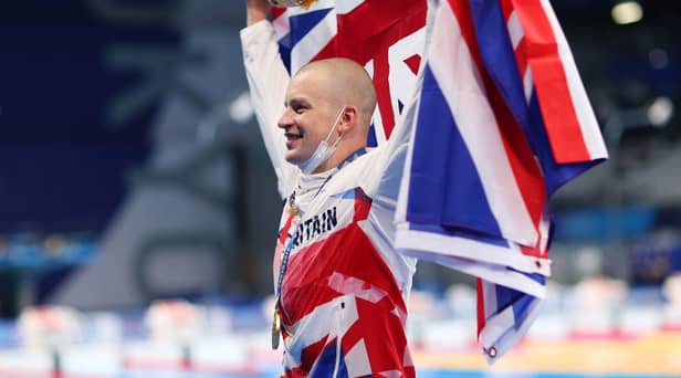 Adam Peaty of Team Great Britain celebrates after winning the gold medal in the Men's 100m Breaststroke Final on day three of the Tokyo 2020 Olympic Games (Photo: Maddie Meyer/Getty Images)